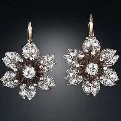 A pair of silver-coloured retro fashion earrings for women made from electroplated alloy.