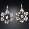 A pair of silver-coloured retro fashion earrings for women made from electroplated alloy.