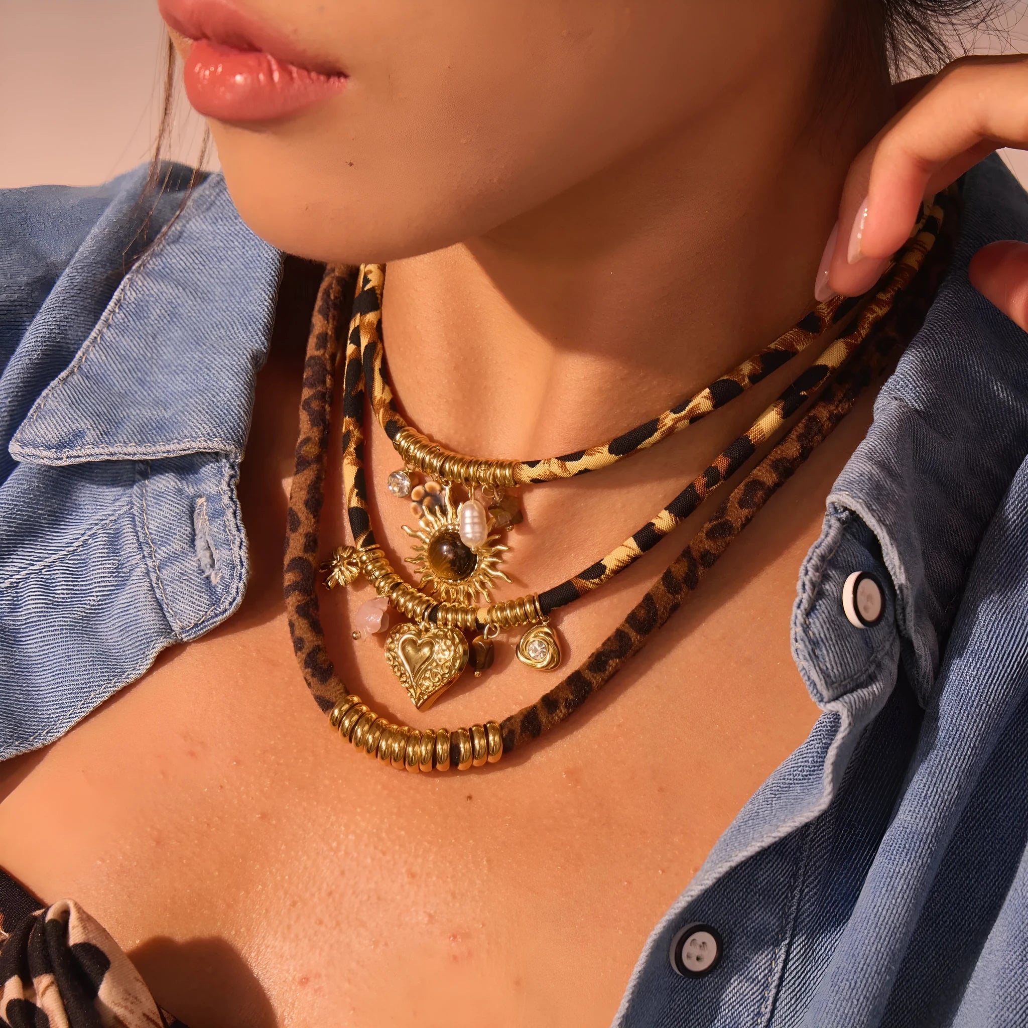 Leopard Series geometric stainless steel necklace with gold electroplated finish on a white background.