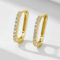 Sterling silver oval zircon ear clips with geometric design in white or yellow finish