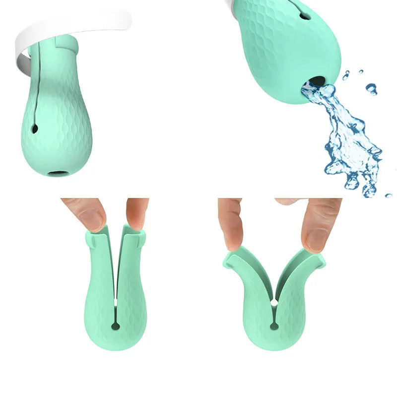 Four green silicone cat paw scratch protection covers with elastic straps