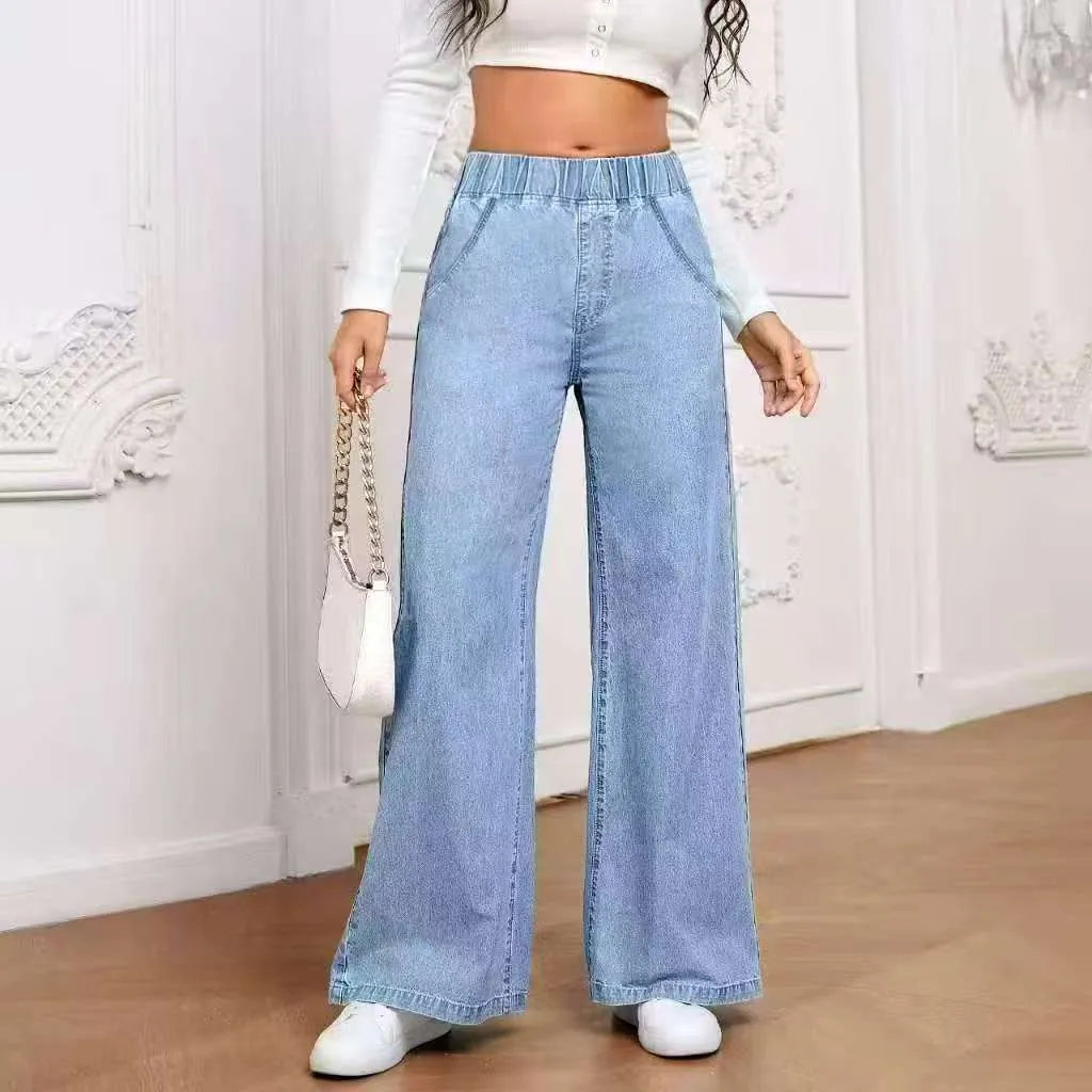 Plus size light blue wash wide leg jeans with straight fit and zip fly