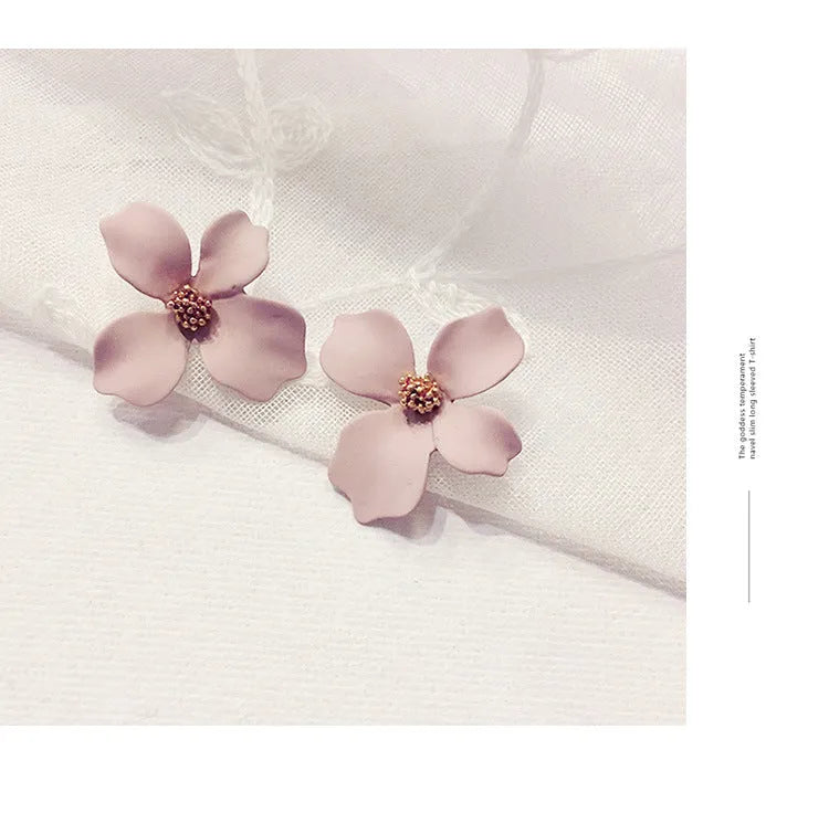 Women's flower stud earrings in alloy with white or pink electroplated finish