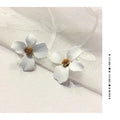 Women's flower stud earrings in alloy with white or pink electroplated finish