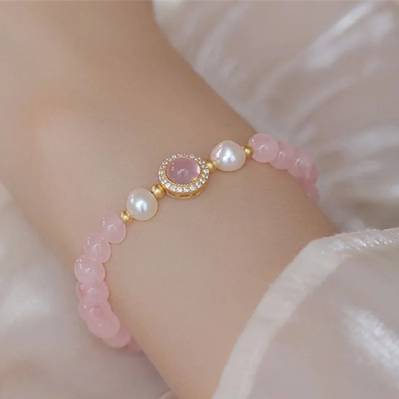 Women's aquamarine crystal bracelet with pink and blue dopamine colours, round geometric beads, handcrafted mixed materials
