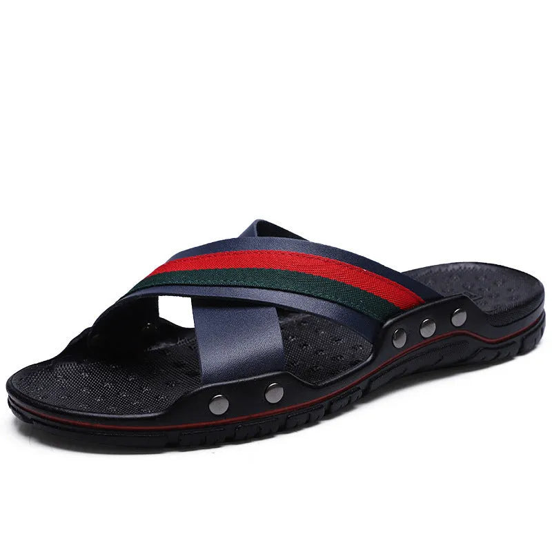 Men's white cowhide leather flip flops with a non-slip PU sole on a beach background.
