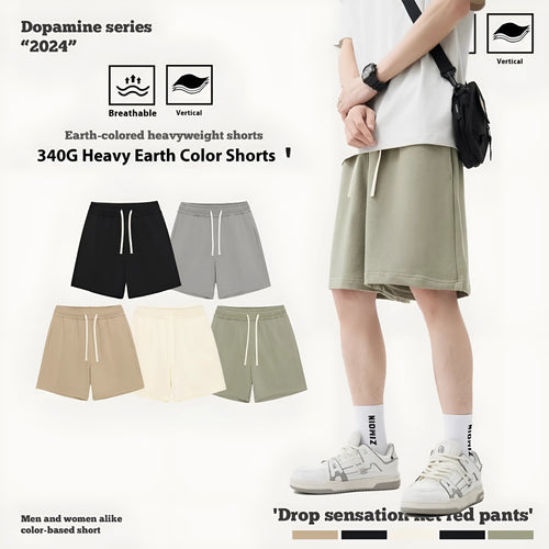 Children's loose-fit denim shorts in charcoal grey on a hanger