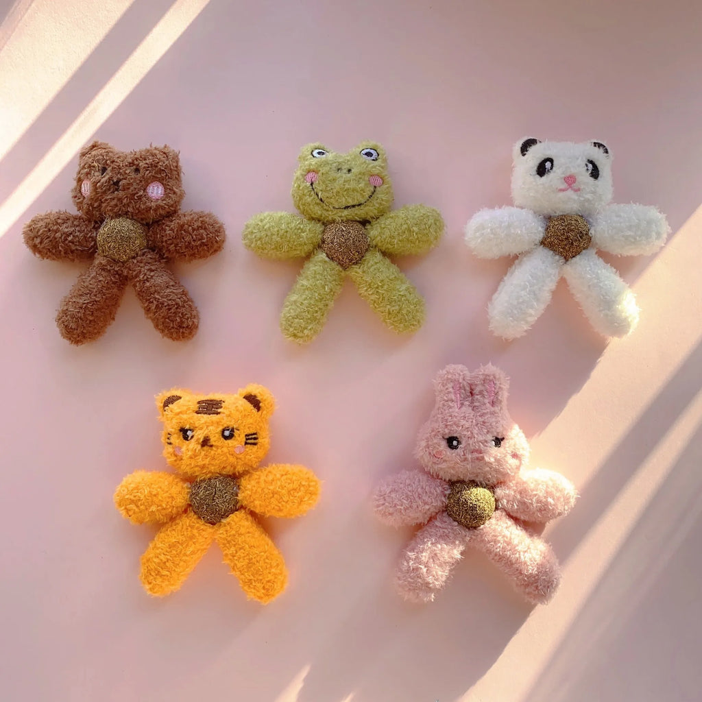 Catnip chewing ball with edible stuffing for dental cleaning in animal designs