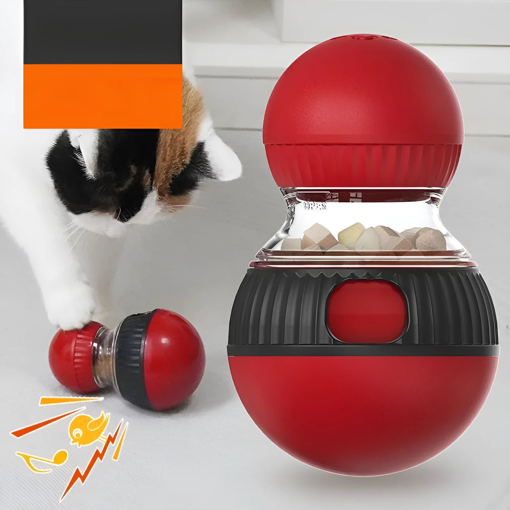 Rotating plastic cat toy with food dropping mechanism and sound elements for interactive play