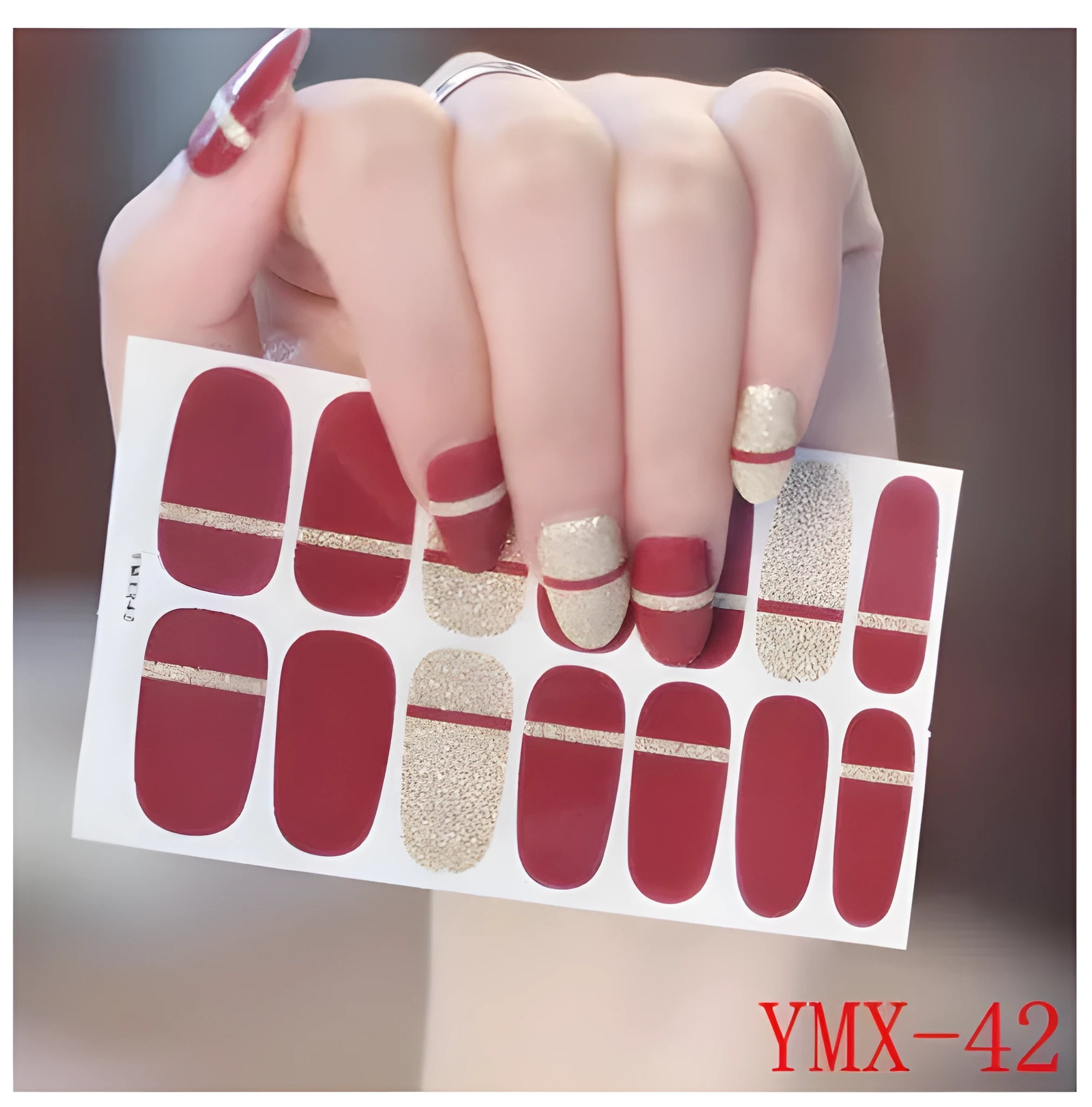 Full nail stickers set of 14 sheets showing 16 colour options in a flat lay arrangement