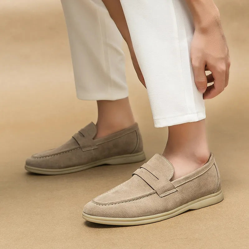 Men's slip-on leather casual shoes in black with mid heel and rubber sole