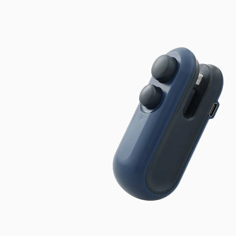 White and blue handheld USB rechargeable heat sealer for sealing food bags with magnetic back.