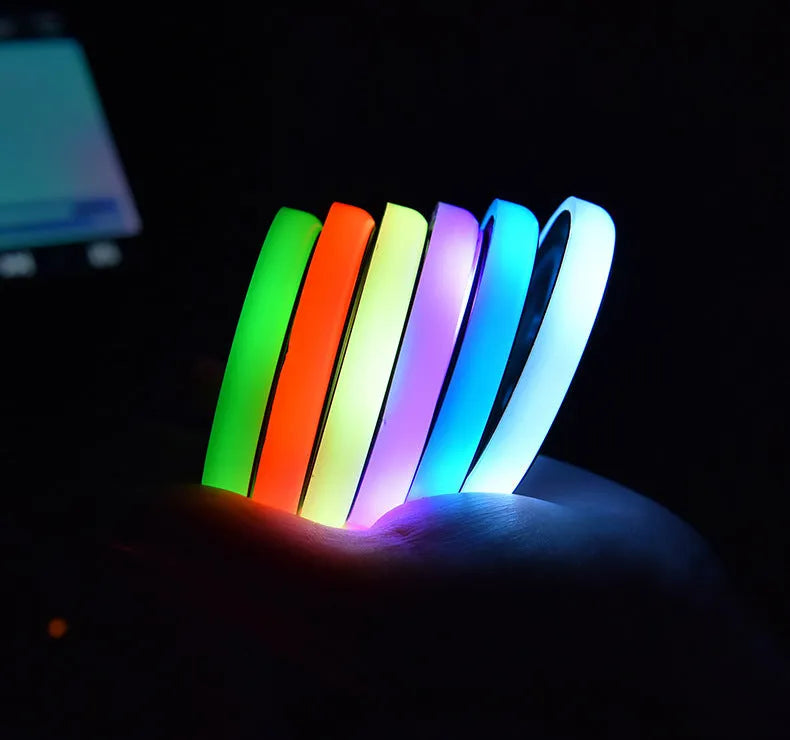 LED light up car cup holder coaster with seven colour options showing solar panel and USB charging port