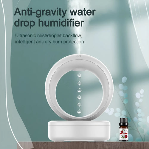 White round anti-gravity air humidifier with levitating water droplets on a desk, USB powered