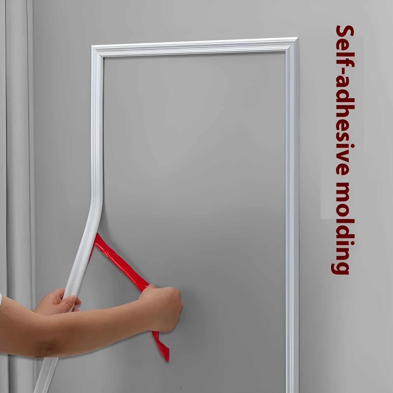 Flexible white PVC self-adhesive wall shaping frame on a blank holder.