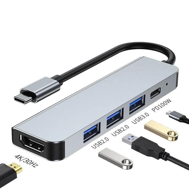Portable six-in-one USB-C expansion dock with 100W charging capability for laptops and tablets