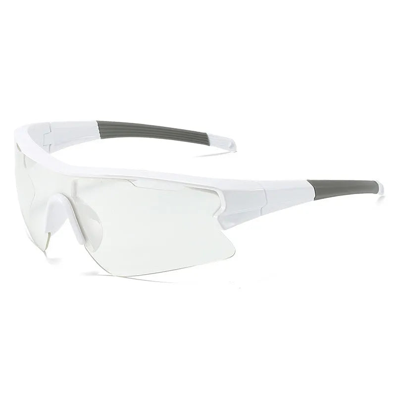 Windproof sports cycling sunglasses in black frame with grey lens on outdoor background.