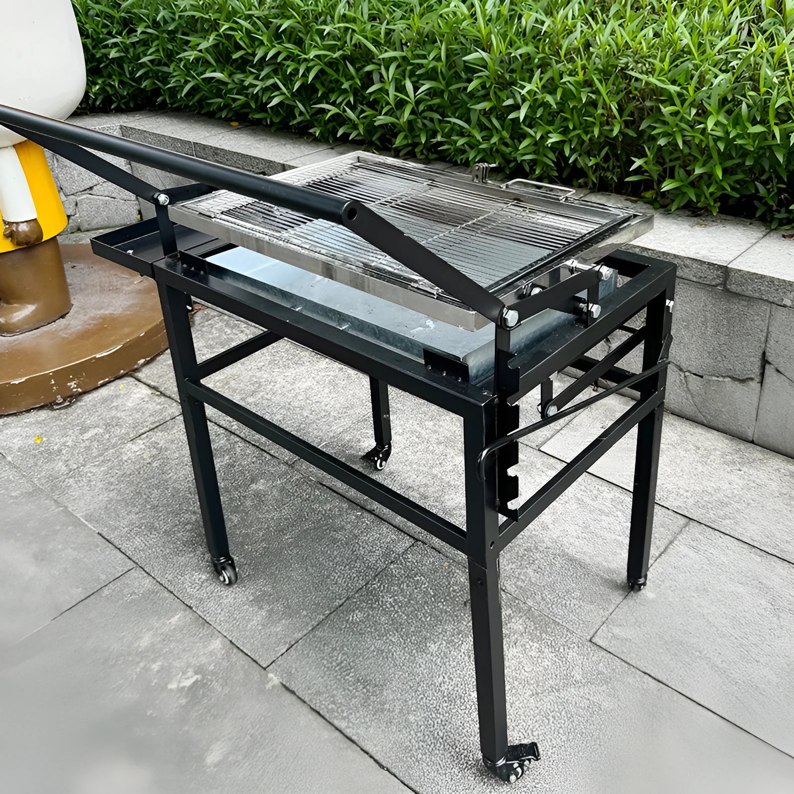 Flip BBQ charcoal stove with folding design and large cooking surface