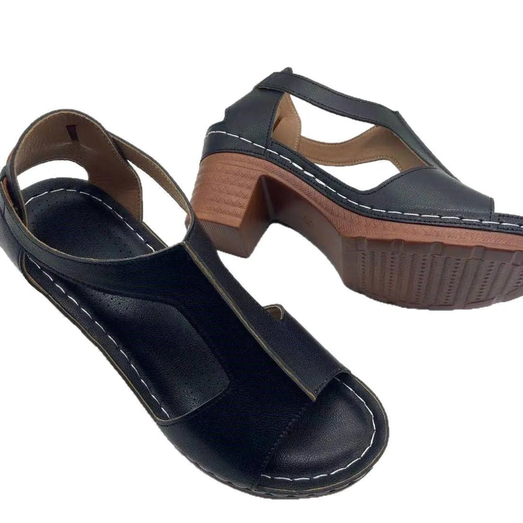 Women's peep toe wedge sandals with buckle detail, low heel, on a white background.