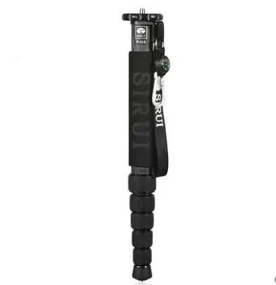 Black carbon fibre monopod for DSLR cameras extended to full height with camera mount visible