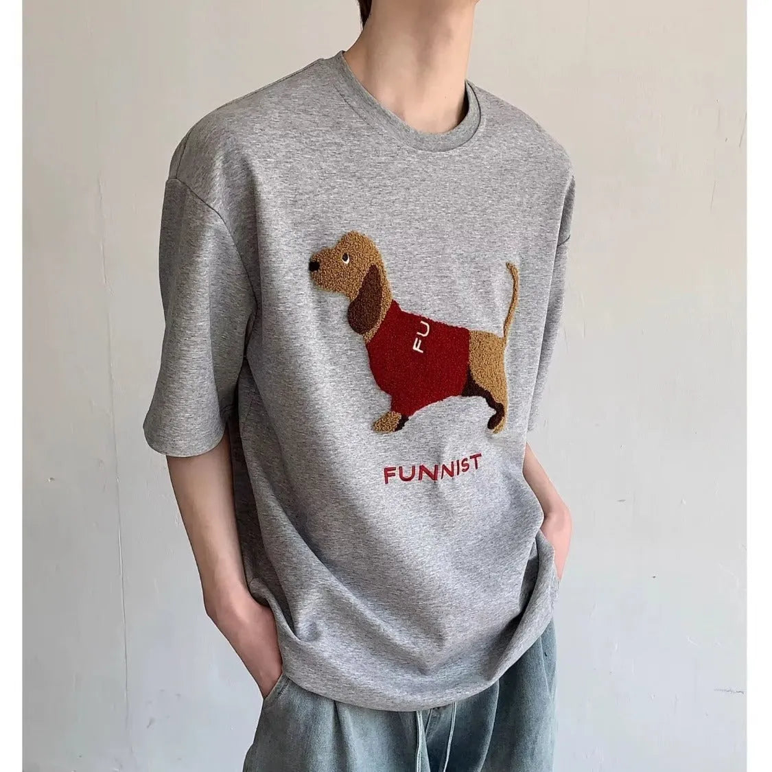 Men's grey cotton t-shirt with embroidered sausage dog design on the chest