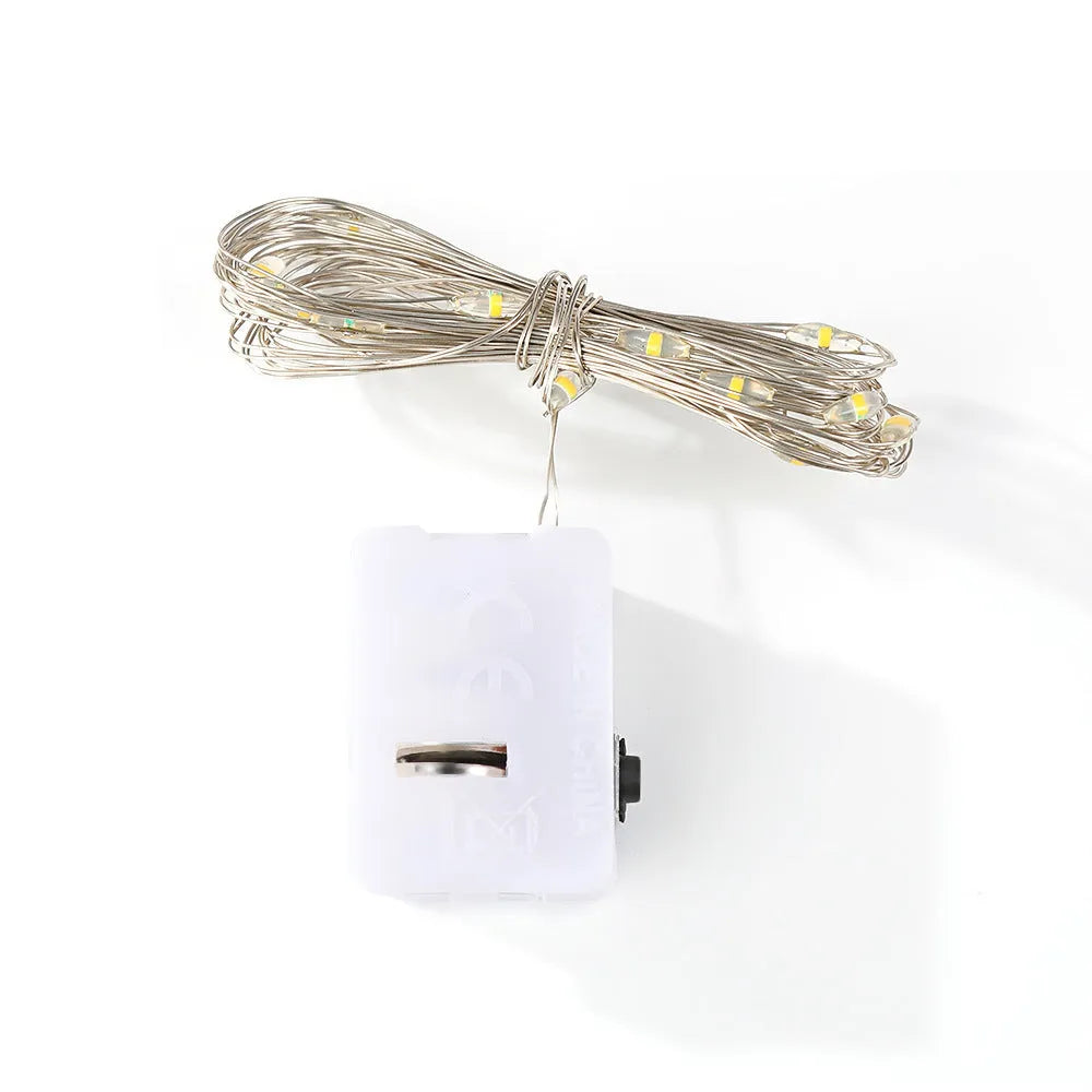2m LED copper wire string light with three-gear colour options in small white box