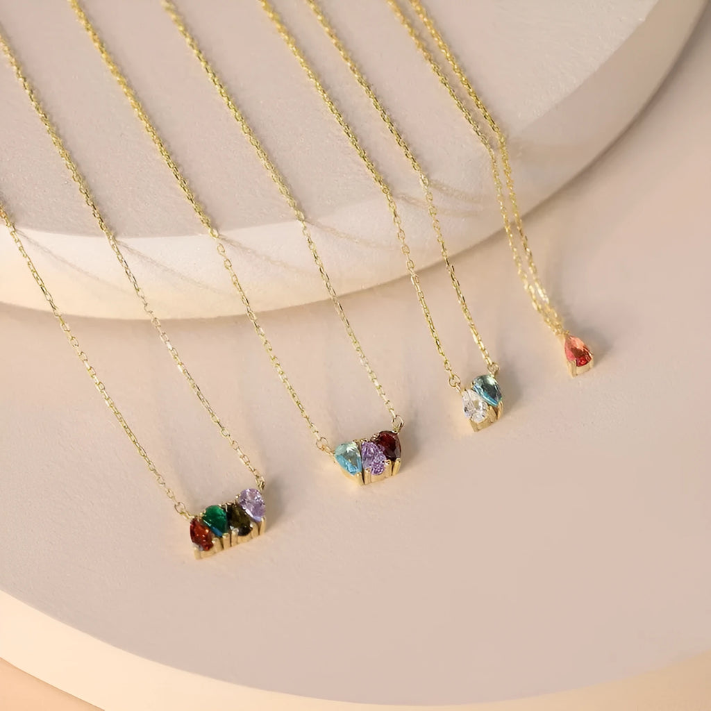Zircon birthstone pendant necklace on a titanium steel chain in gold finish