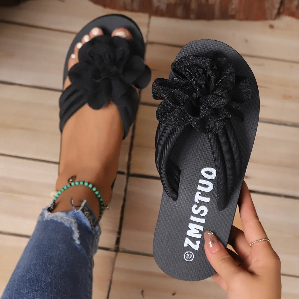 Women's solid colour PU upper flower flat toe flip-flop sandal in beige white, side view