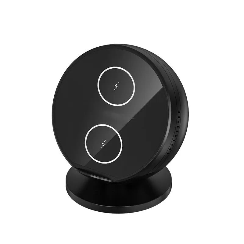Black multifunctional mobile phone wireless charger holder with Bluetooth speaker, showing phone in cradle.