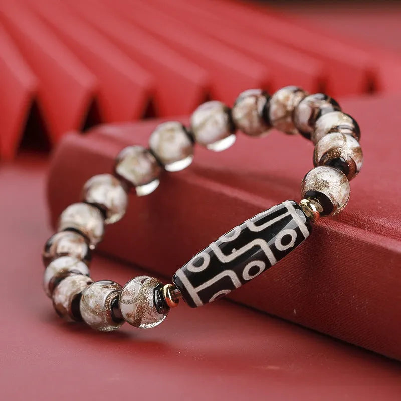Handcrafted Chinese coloured glaze bracelet with snake year beads in auspicious patterns