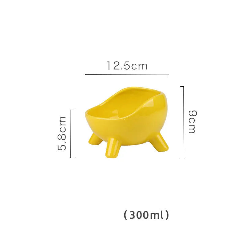 Green ceramic pet bowl with four legs and wide-mouth design for cats and small dogs