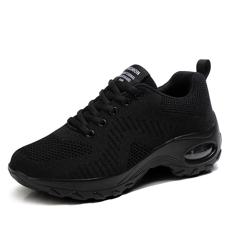 Women's red and black low top mesh sneakers with round toe and front lace-up design showing 3-5cm heel