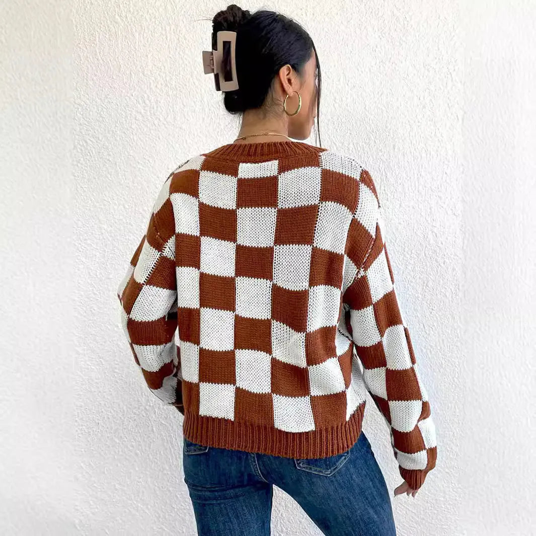 Dark brown acrylic pullover sweater with a chessboard plaid pattern and loose round neck.
