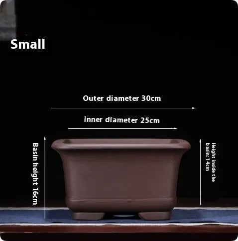 Large Chinese-style purple clay flower pot for indoor bonsai and plants.