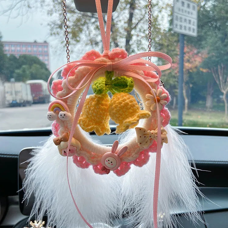 Handmade wool bell orchid car pendant hanging from rear-view mirror