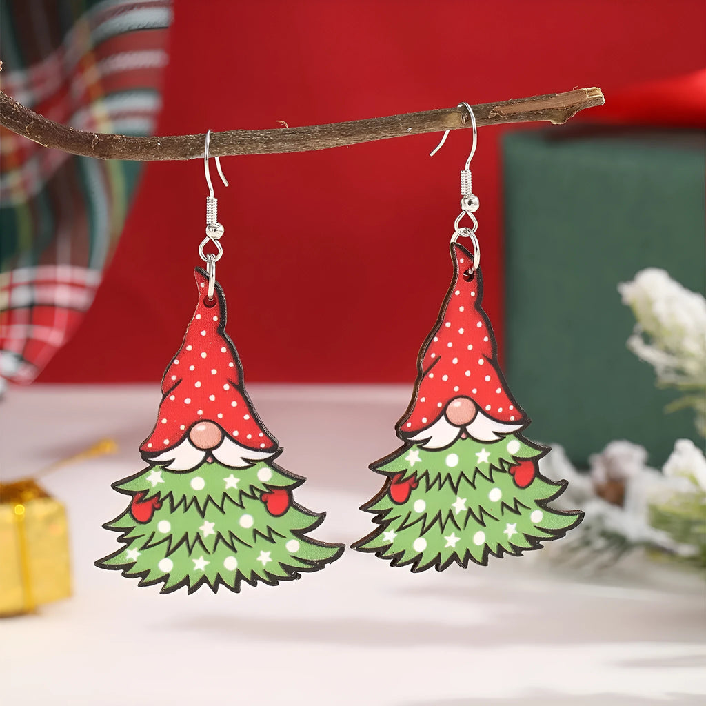 Wooden Christmas earrings with geometric tree and snowman designs featuring Santa Claus elements