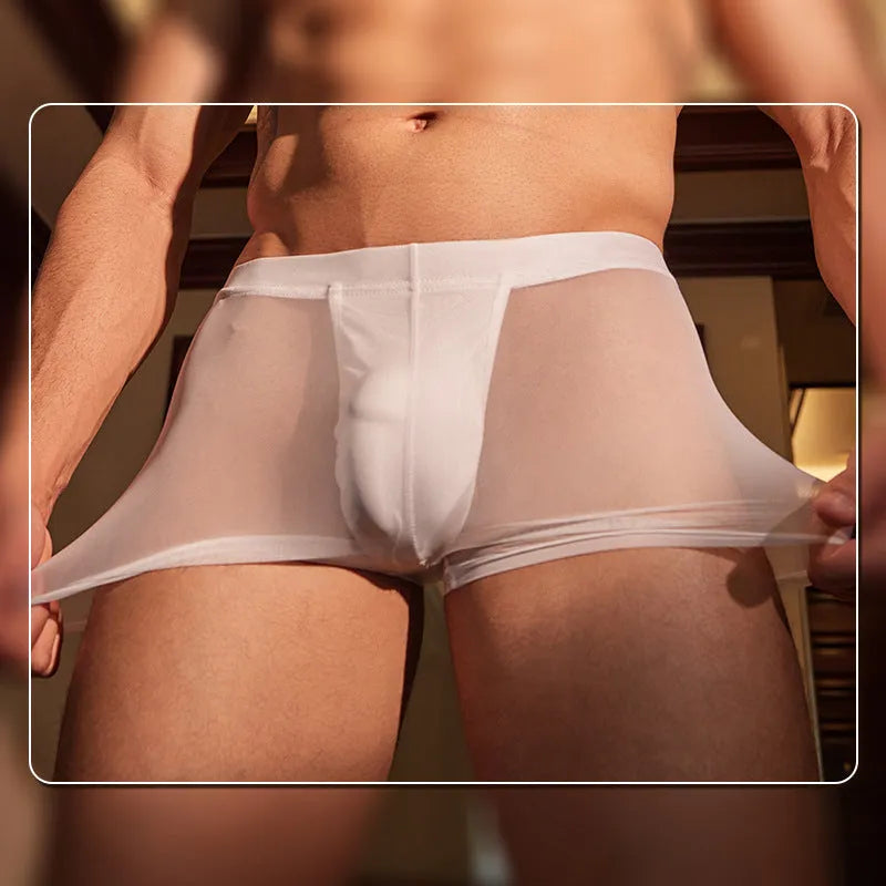 Men's black and white breathable nylon boxer briefs laid flat showing ultra-thin fabric.