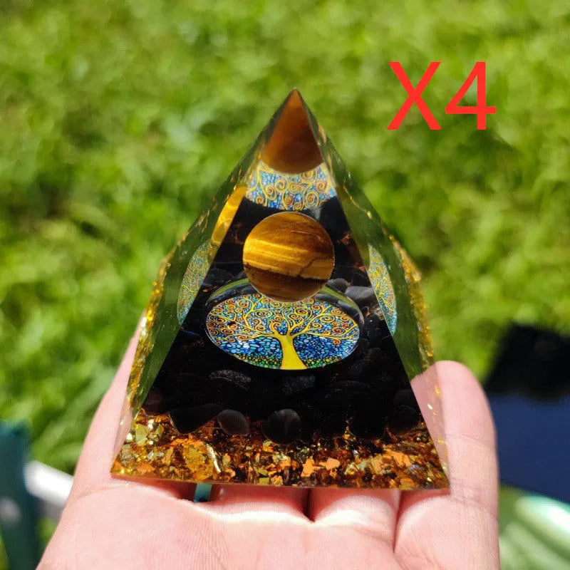 Clear epoxy resin pyramid ornament with embedded blue lapis lazuli crystal gravel, 6cm tall.