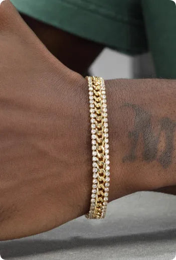 Gold tennis bracelet for men and women with titanium steel construction and gemstone inlays.