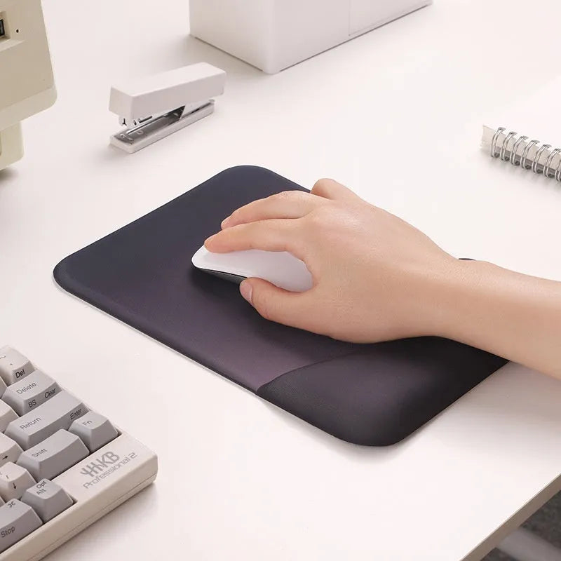 Square silica gel wrister mouse pad with cloth surface showing colour options including black, blue, pink and purple