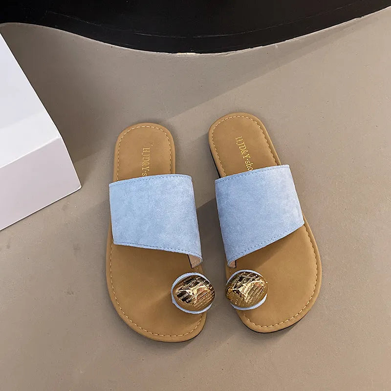 Women's flat bottomed French toe flip flops in solid colours on a light background
