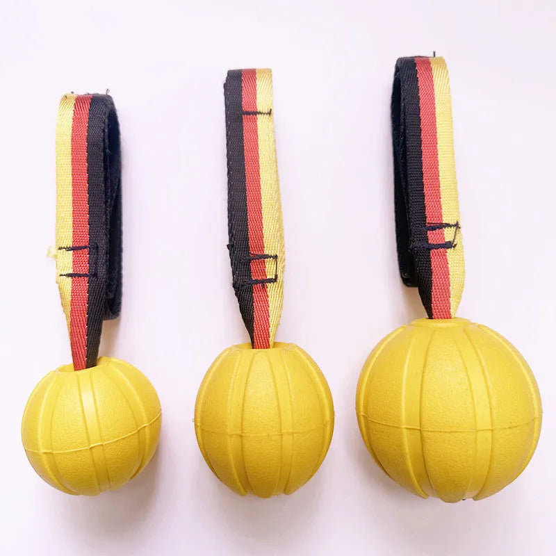 Floating camouflage and yellow EVA string ball dog toy shown in 6.5cm, 7cm and 9cm diameter sizes