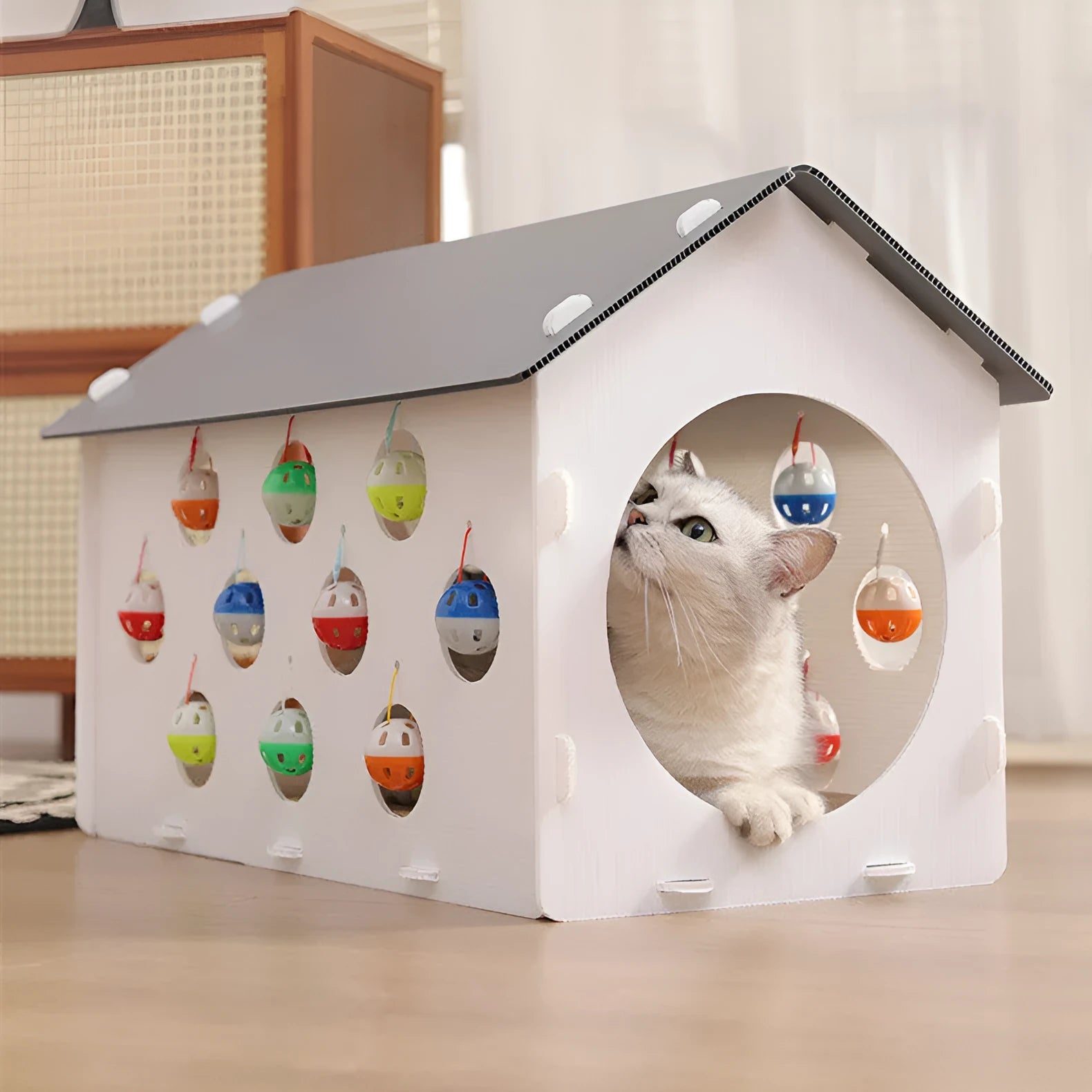 Integrated plastic cat scratch board with nest bed and tunnel containing bell ball