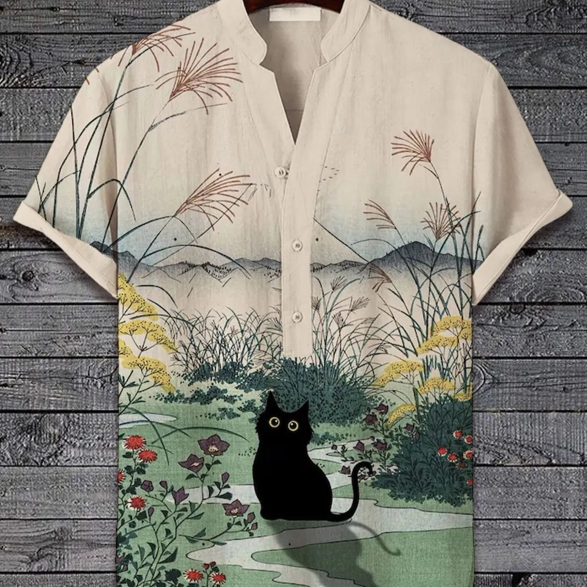 Man wearing a short sleeve t-shirt with a bold 3D digital animal graphic print on the front.