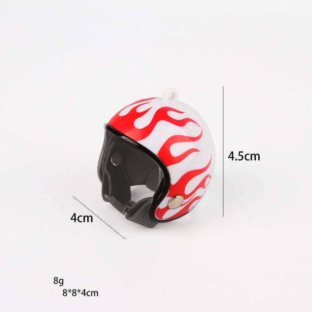 Small adjustable plastic safety helmet for a chicken or bird, shown in a fun design.