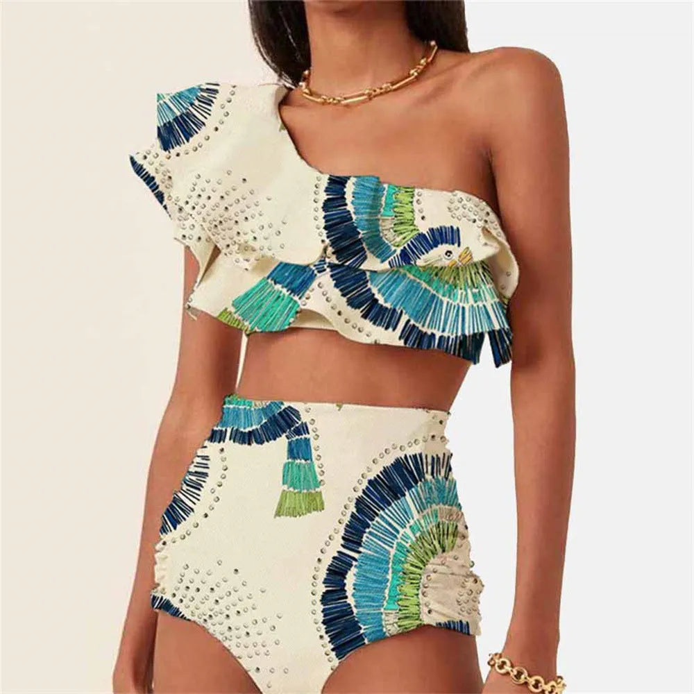 White women's swimsuit with one-shoulder design featuring large lotus leaf detailing and split hem