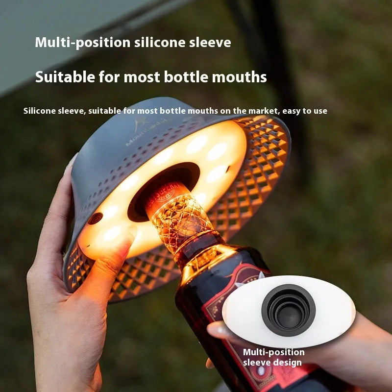 Beige wine bottle shaped camping lantern with LED lights and USB-C charging port