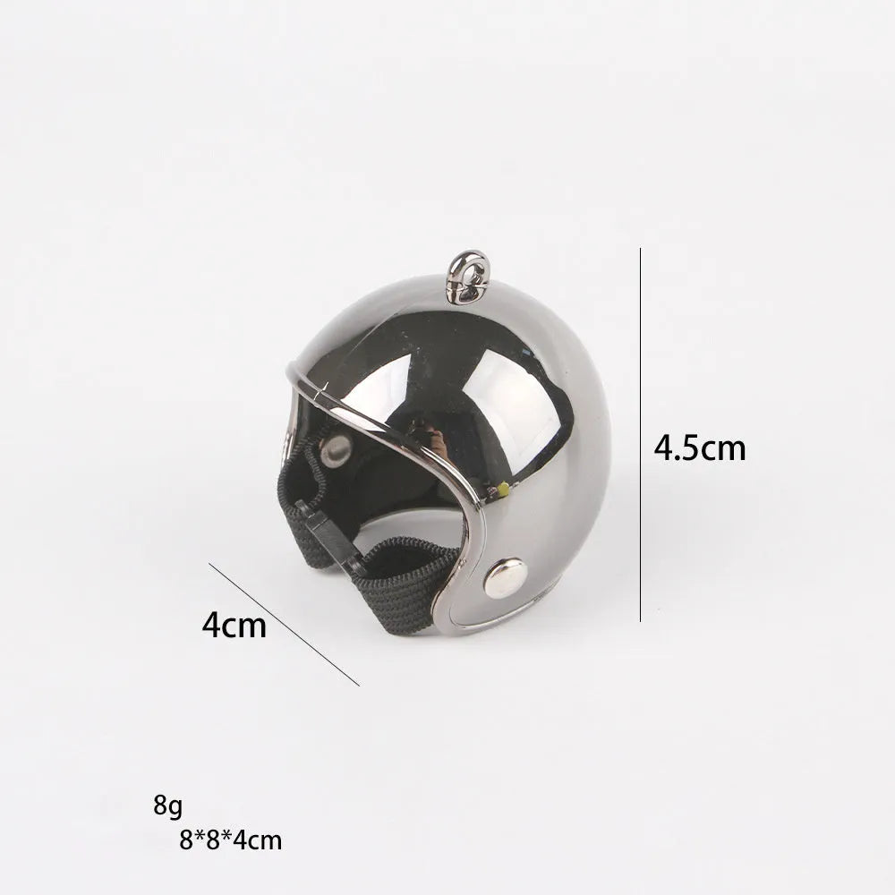 Small adjustable plastic safety helmet for a chicken or bird, shown in a fun design.
