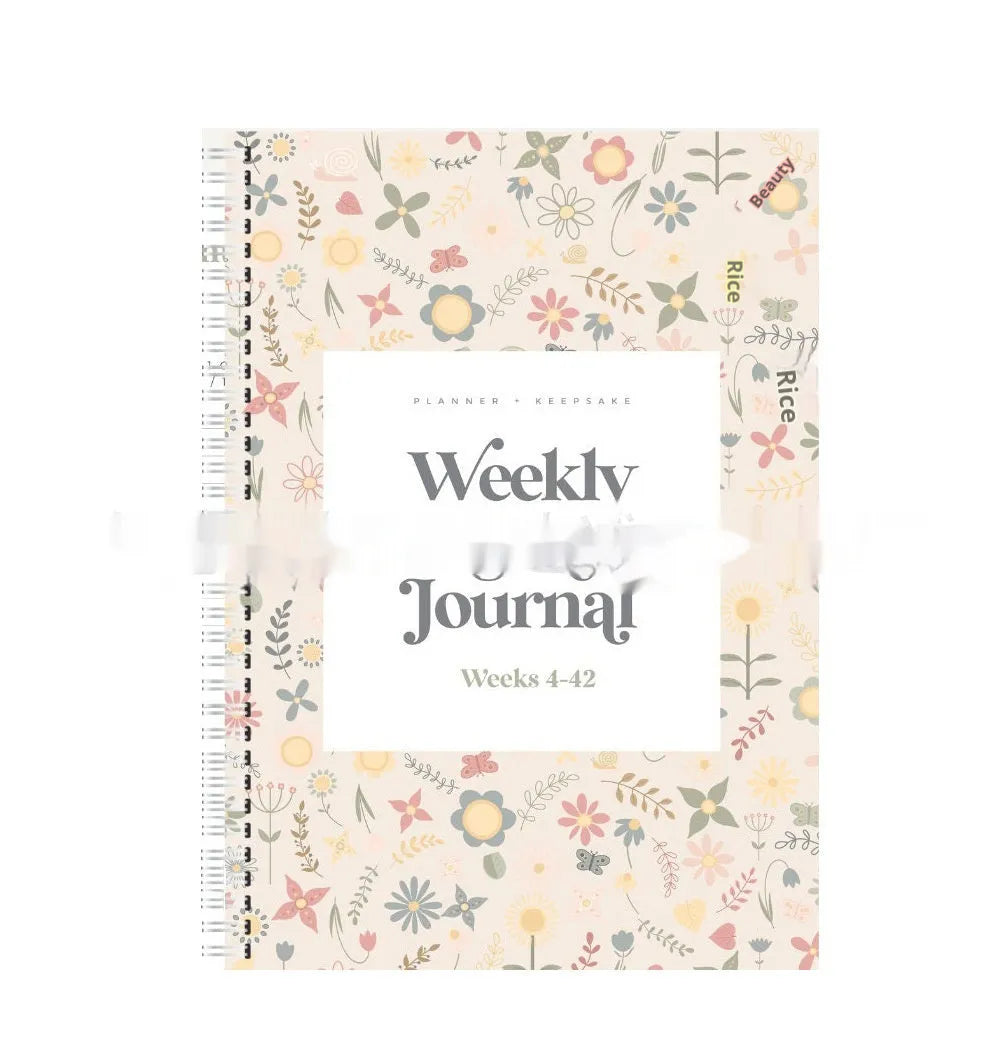 A5 Pregnancy Weekly diary notebook open on a weekly spread