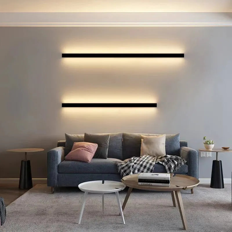 A sleek, black 80cm long strip LED wall lamp with a PC shade and touch control for three light colours.